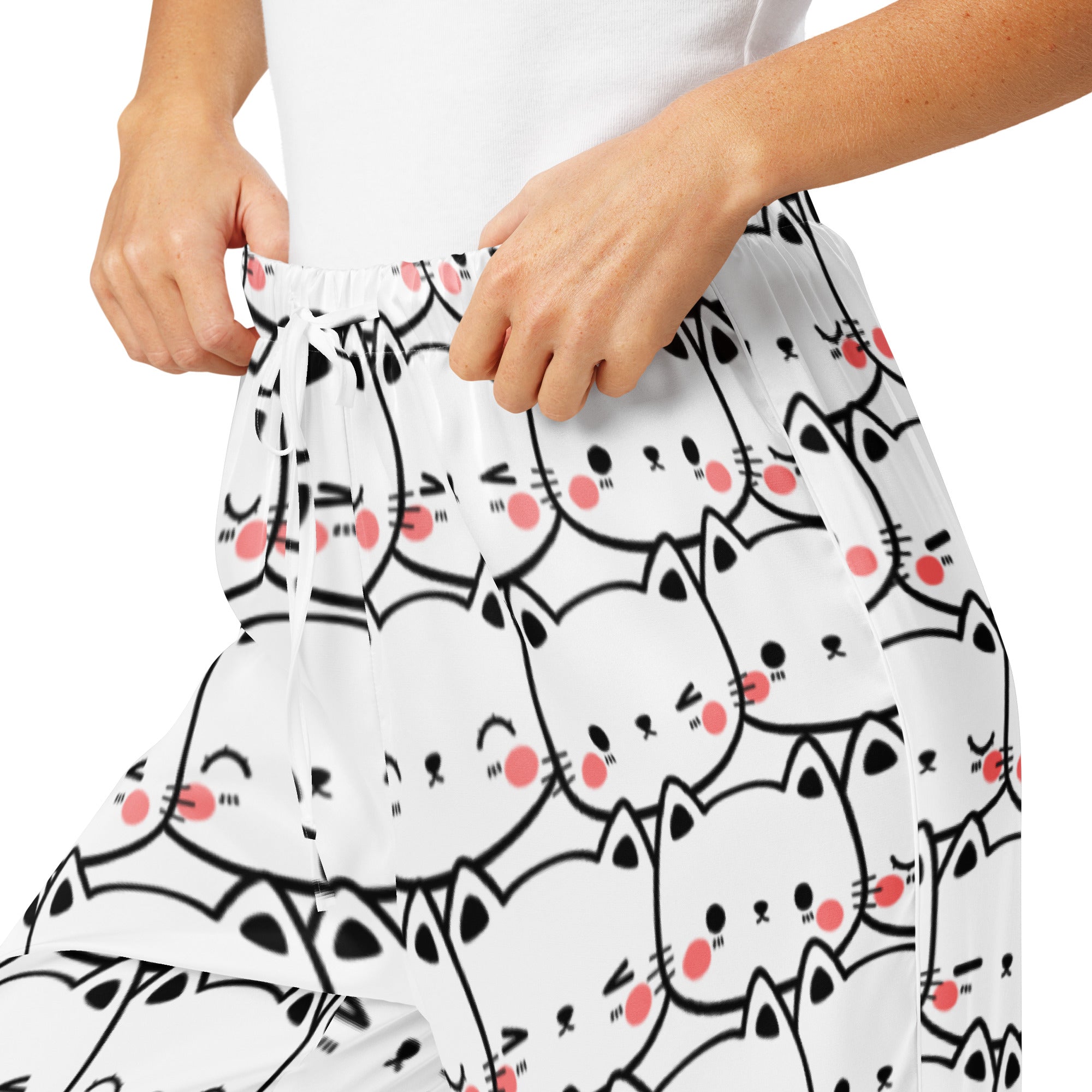 Women’s white lightweight pajama pants with black outlined cartoon cats and pink cheeks featuring a drawstring waist
