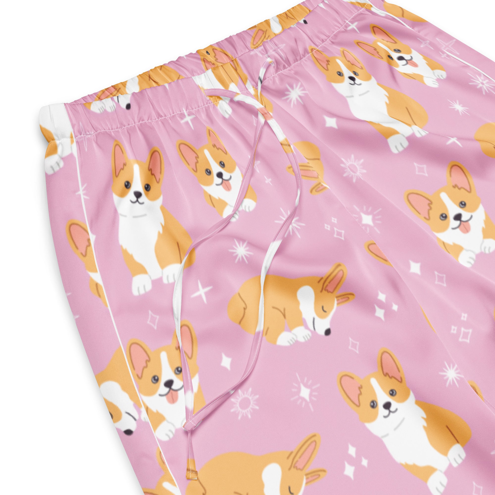 Women’s lightweight pink pajama pants with drawstring waist featuring playful orange and white cartoon corgis and starbursts