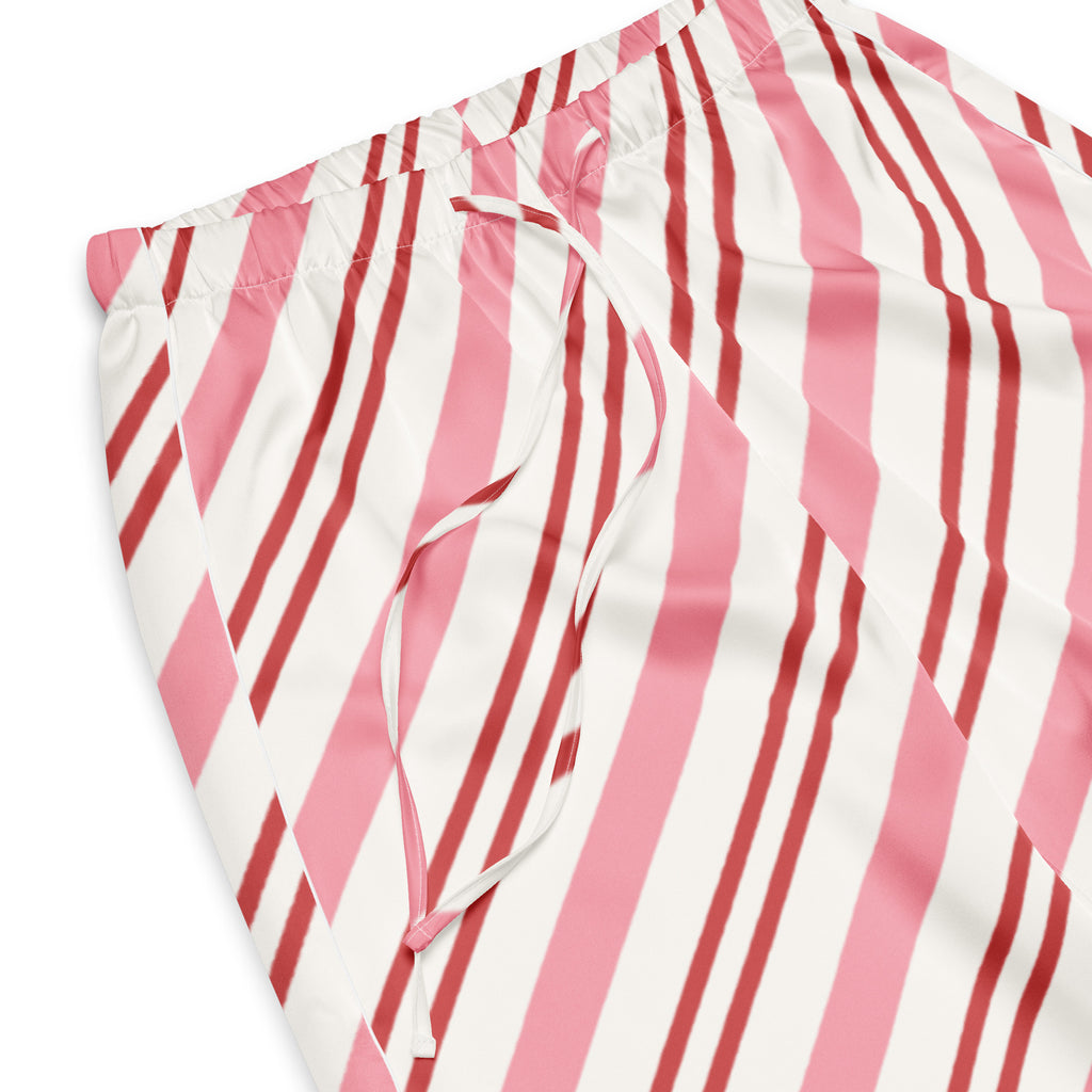 Women’s pink candy cane striped lightweight pajama pants with a relaxed fit and drawstring waistband