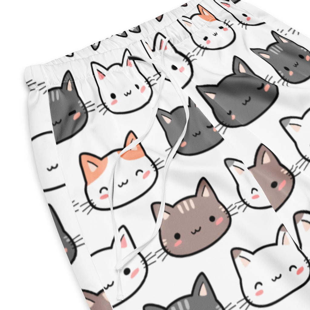White women’s pajama shorts with playful gray white and orange cartoon cat print and a drawstring waist