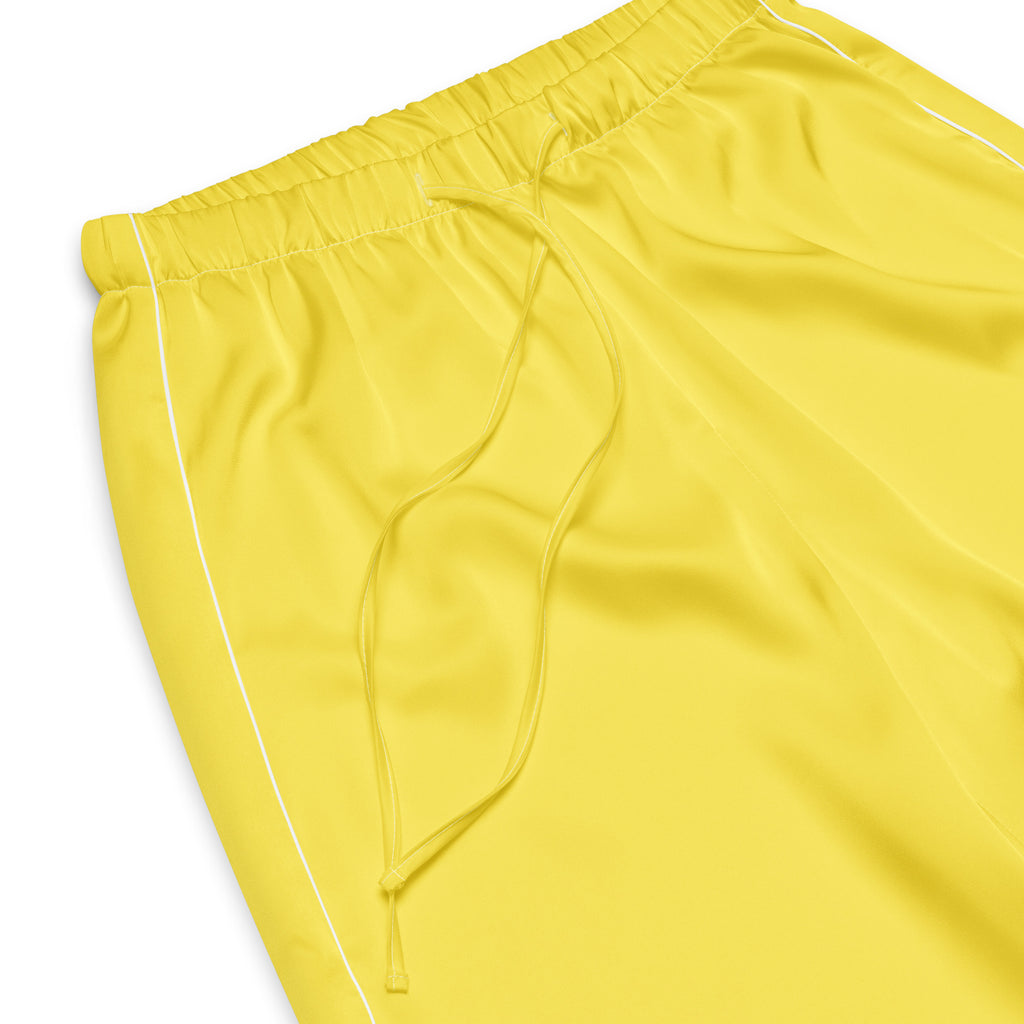 Women’s bright yellow lightweight pajama pants with white piping and drawstring waistband for relaxed fit comfort