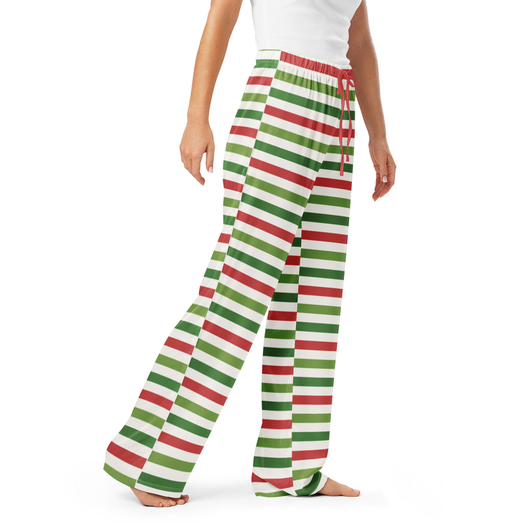 Women’s Christmas stripe pajama pants with lightweight white fabric, red and green stripes, and elastic waistband with drawstrings