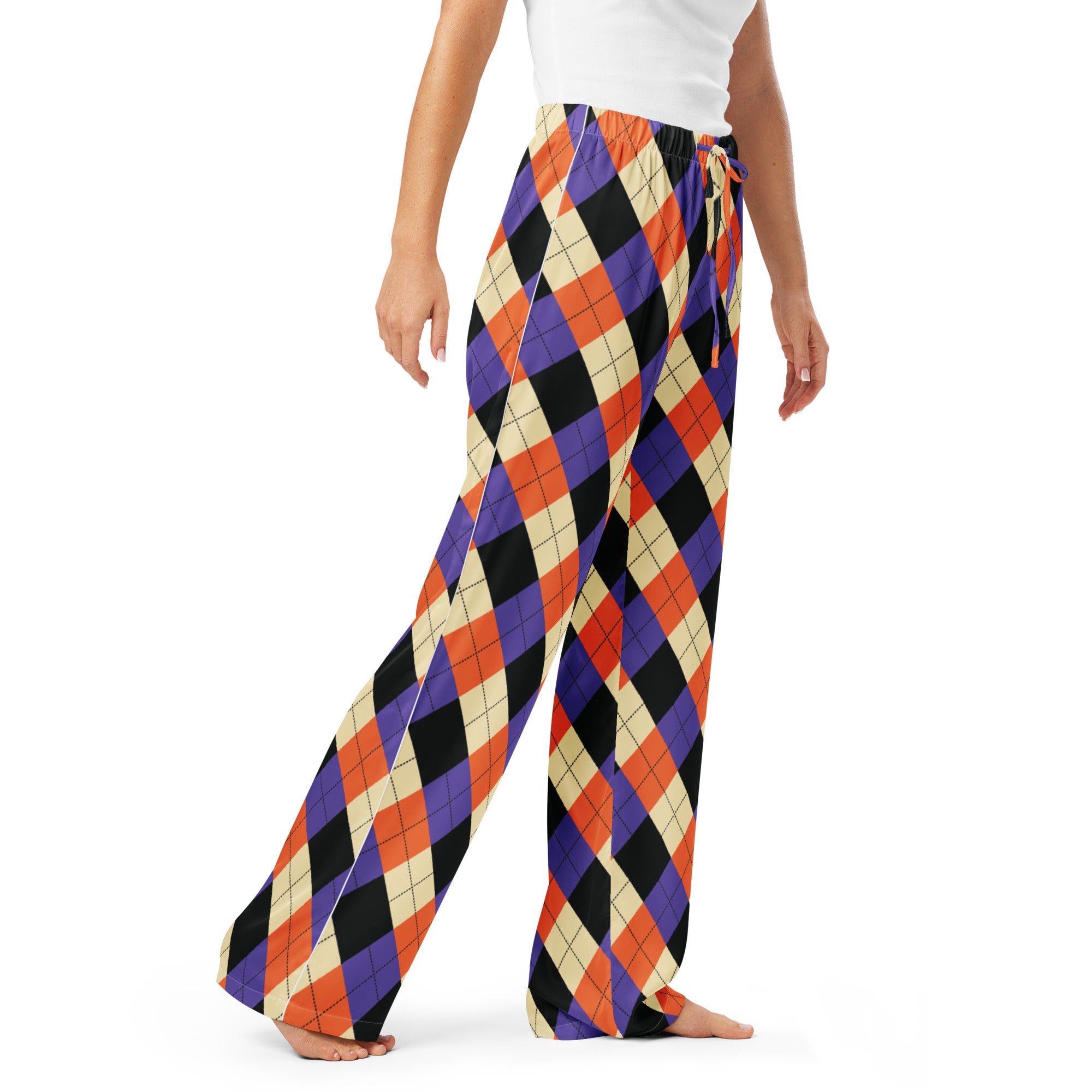 Women’s wide-leg lightweight pajama pants with a bold purple orange black and cream argyle pattern and drawstring waist