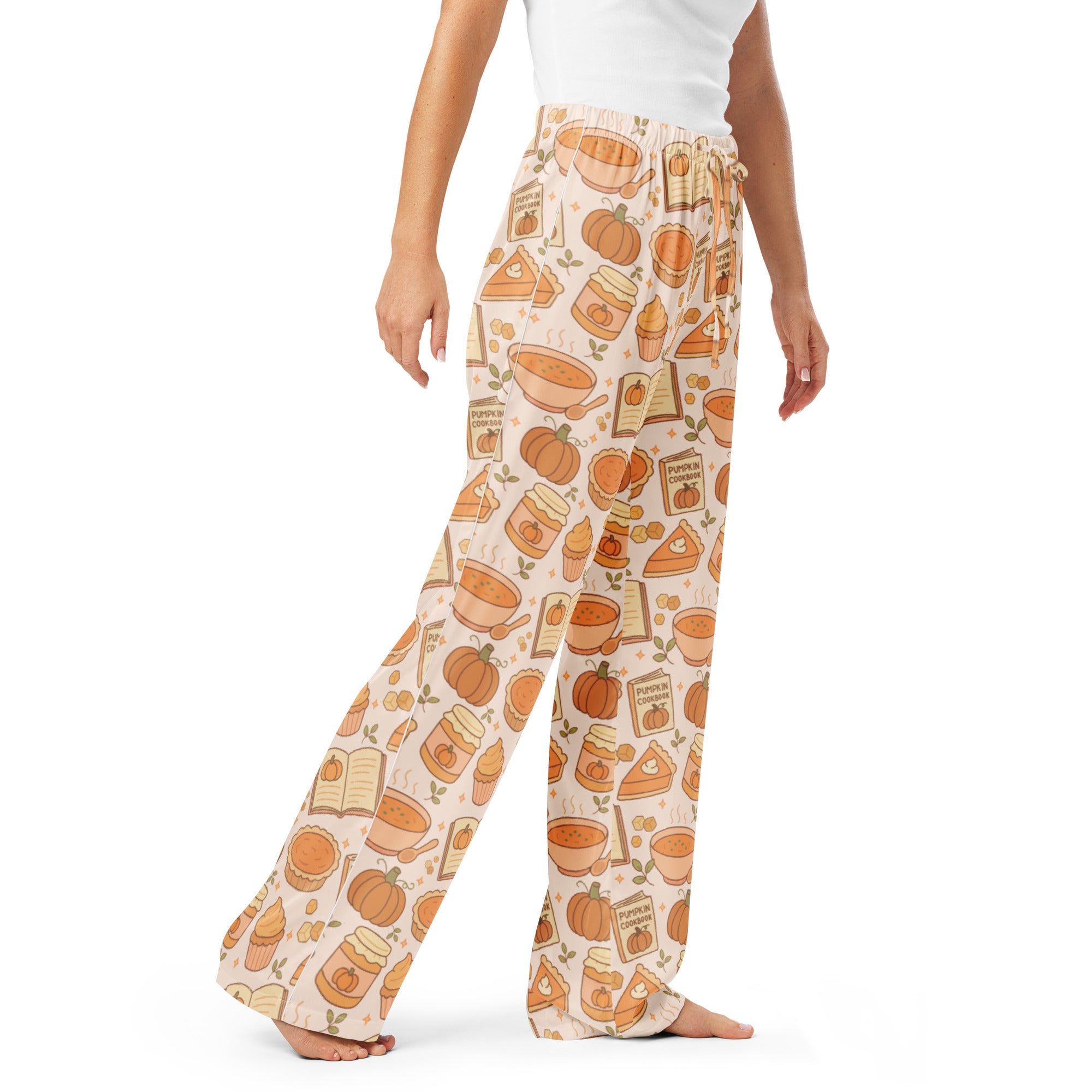Cream-colored women’s pumpkin pie themed lightweight pajama pants with playful autumn pumpkins pies and books pattern