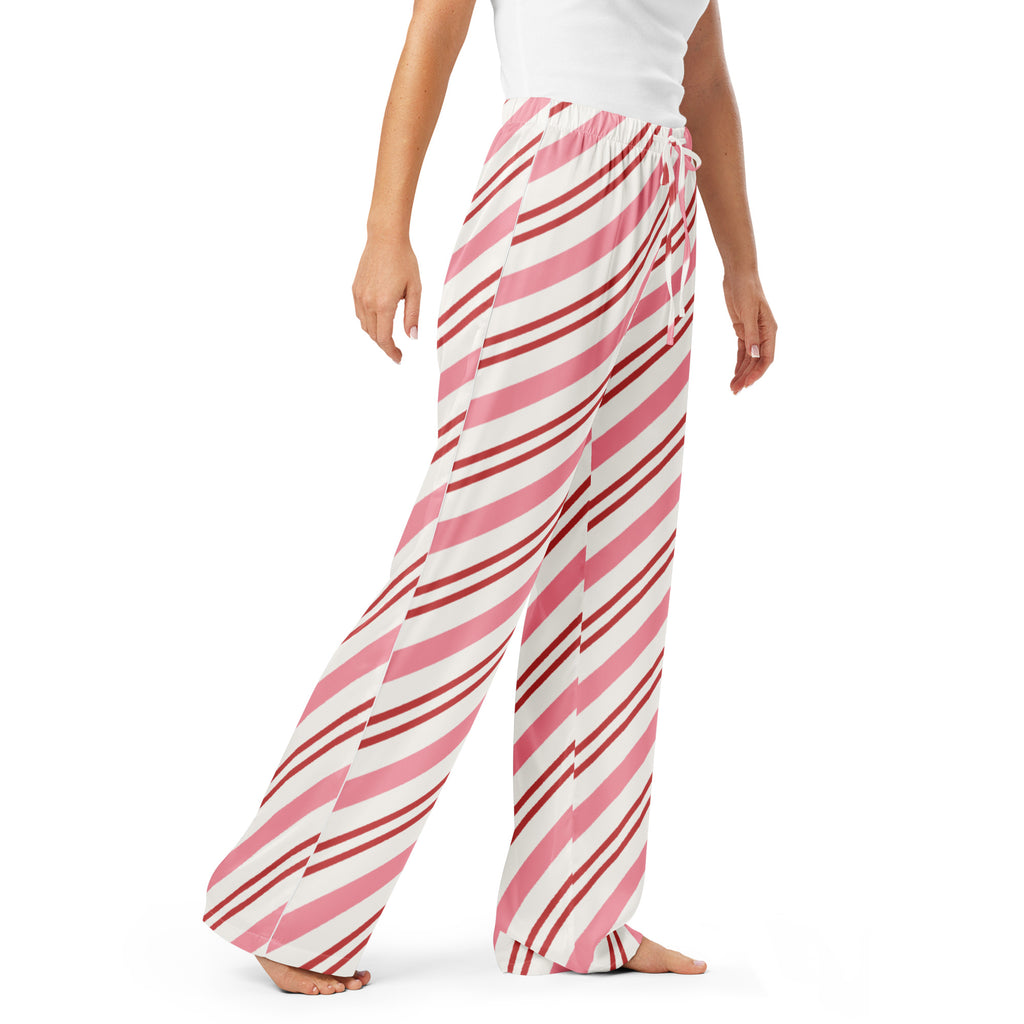 Women’s pink candy cane stripes pajama pants with lightweight fabric wide-leg fit and drawstring waist