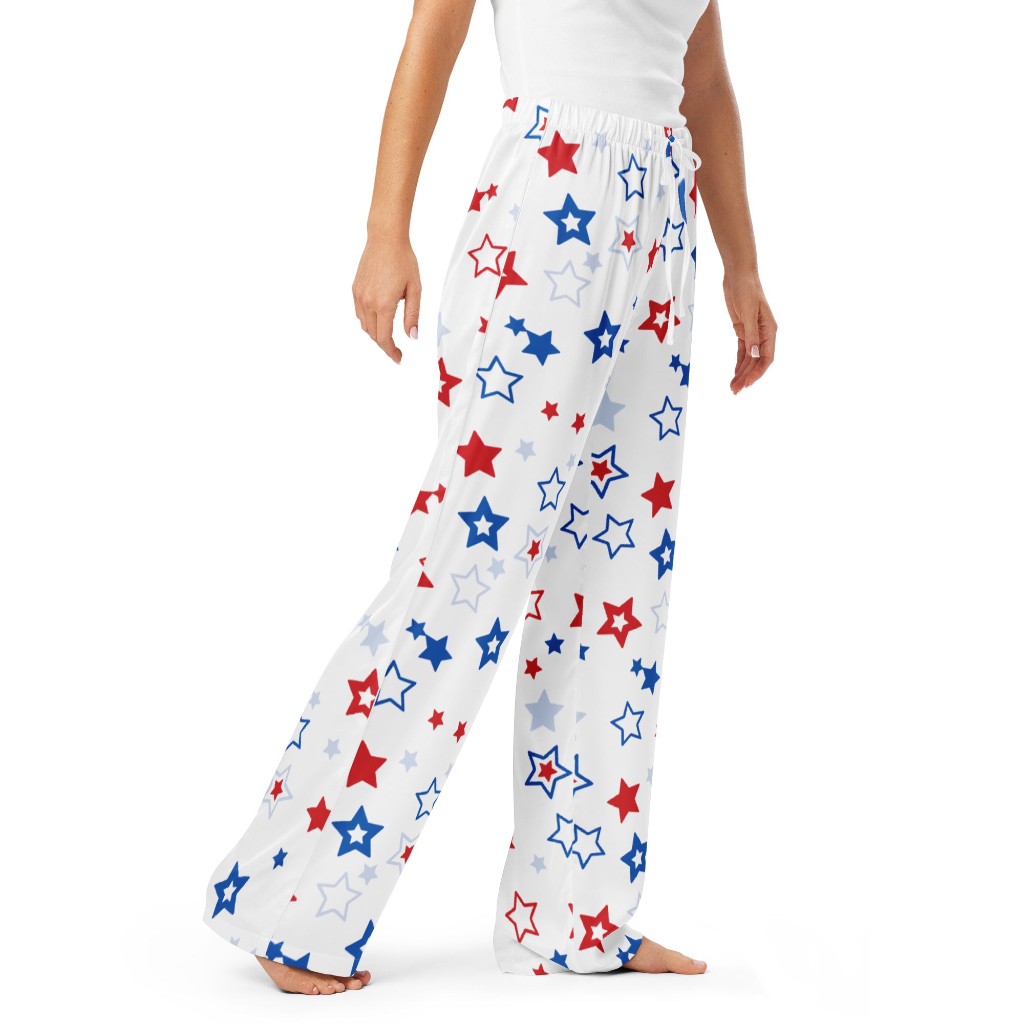 Women’s white lightweight pajama pants with a relaxed fit and patriotic red blue silver star pattern and drawstring waist