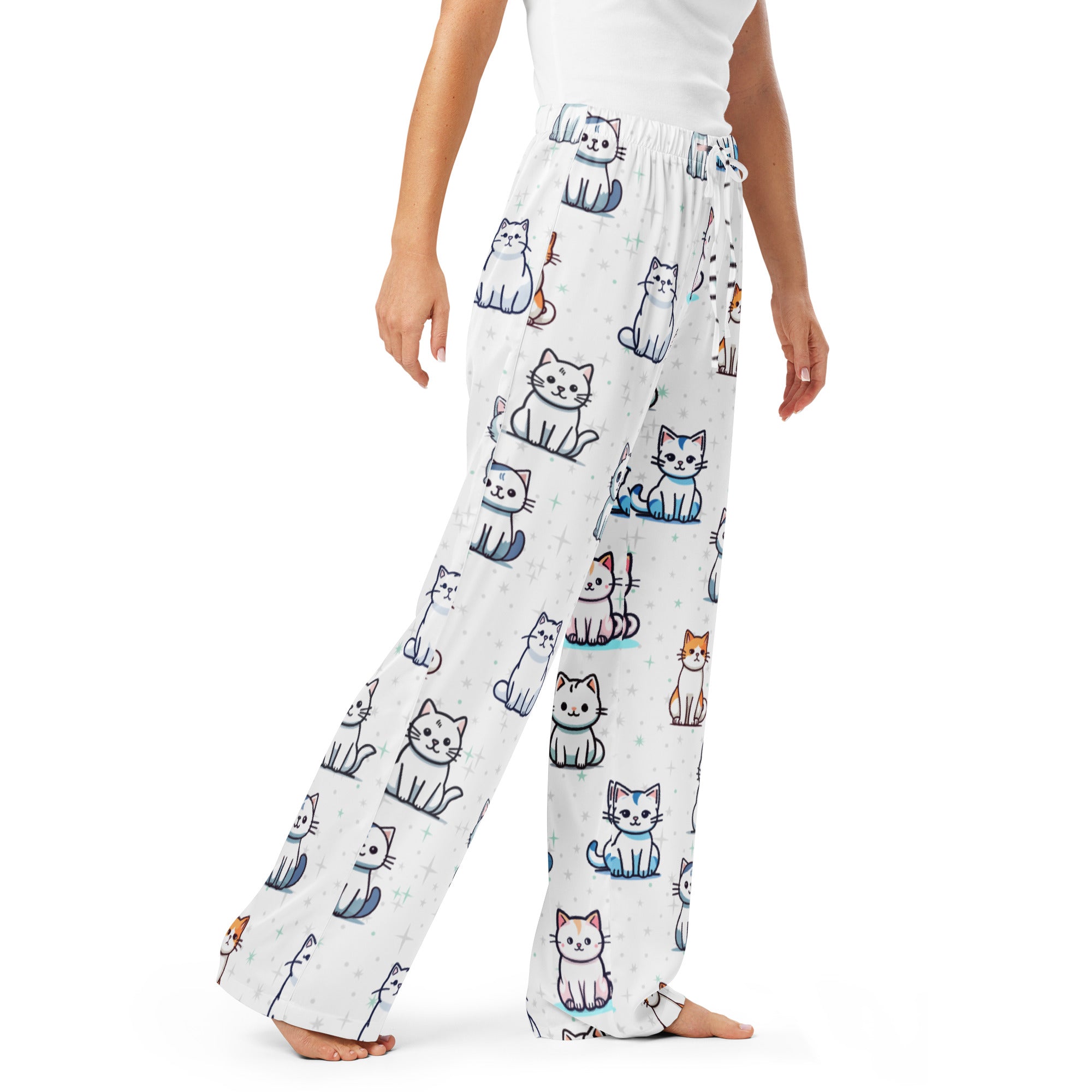 White lightweight women’s pajama pants with colorful cartoon cat pattern and drawstring waist for relaxed fit