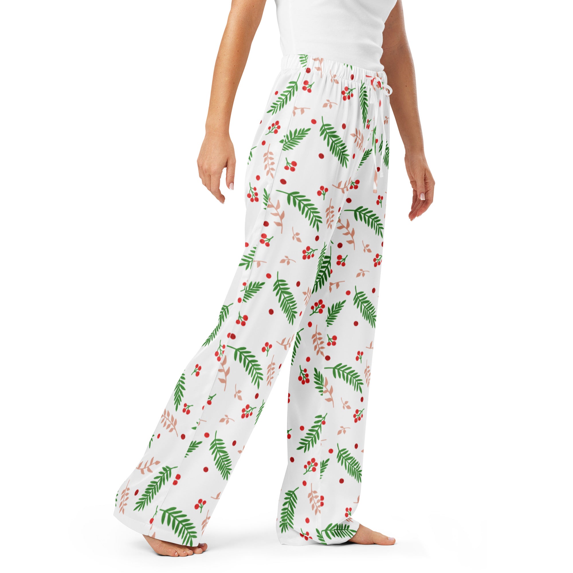 Women’s white christmas berry and pine pajama pants with green leaves red berries on lightweight flowing fabric