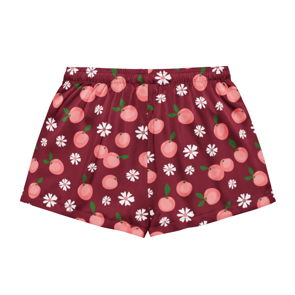 Women’s burgundy silky pajama shorts with lightweight relaxed fit and drawstring waist featuring pink peaches and daisies