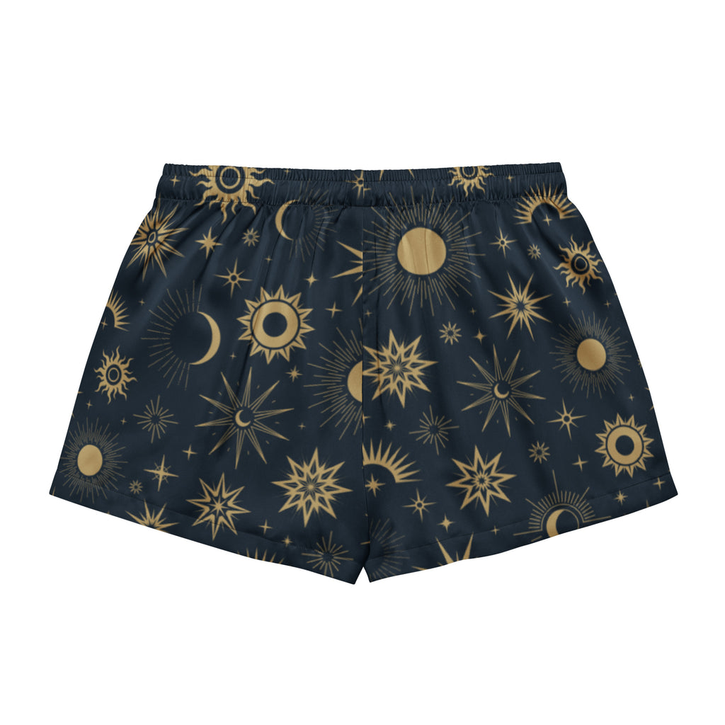 Dark blue women’s silky pajama shorts with vibrant gold sun moon and star celestial pattern and drawstring waist