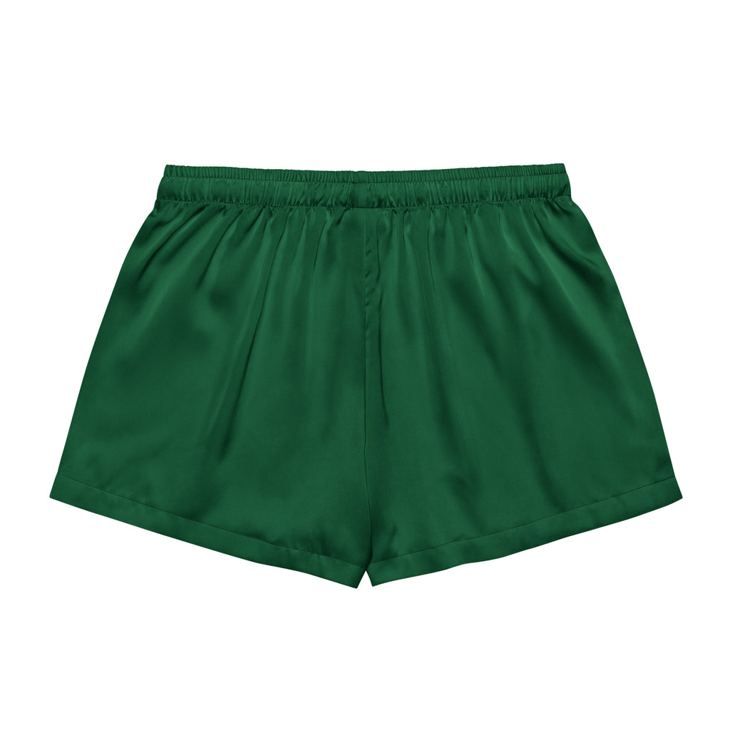 Women’s dark green silky pajama shorts made of deep green satin with elastic waistband and relaxed lightweight fit