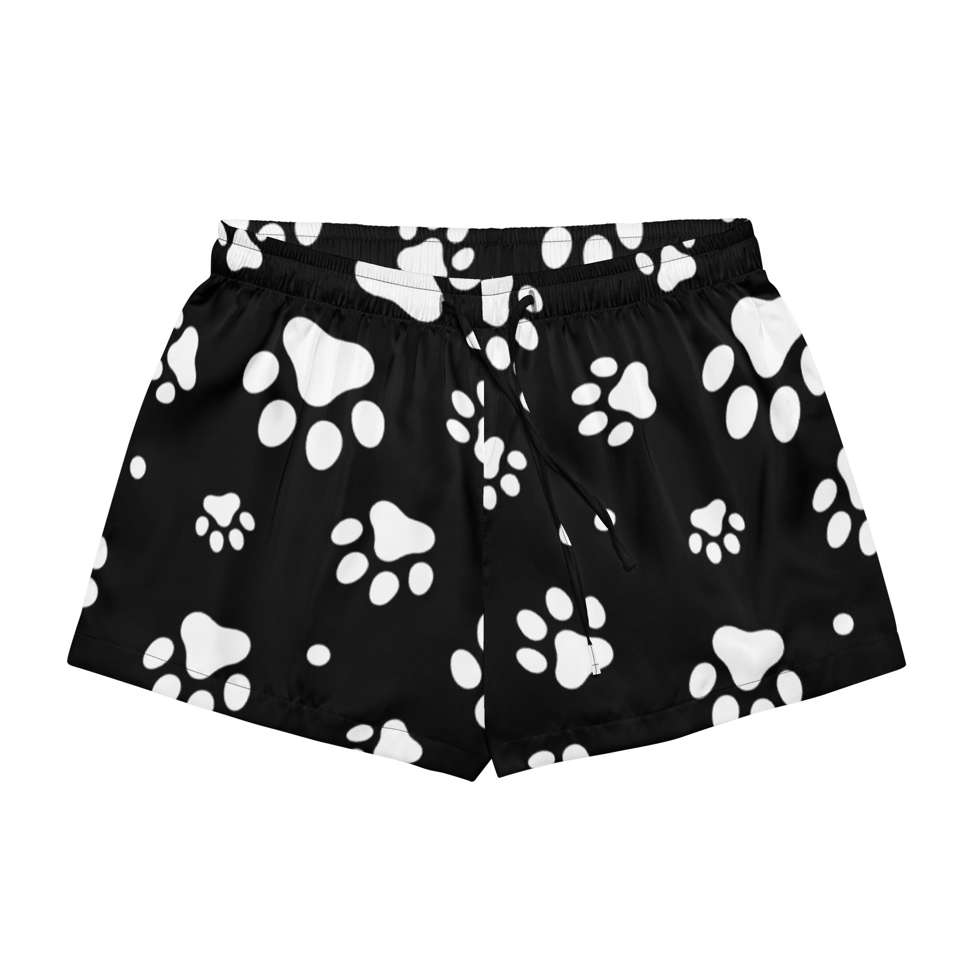 Women’s black silky pajama shorts with playful white paw print pattern and elastic drawstring waistband for relaxed fit