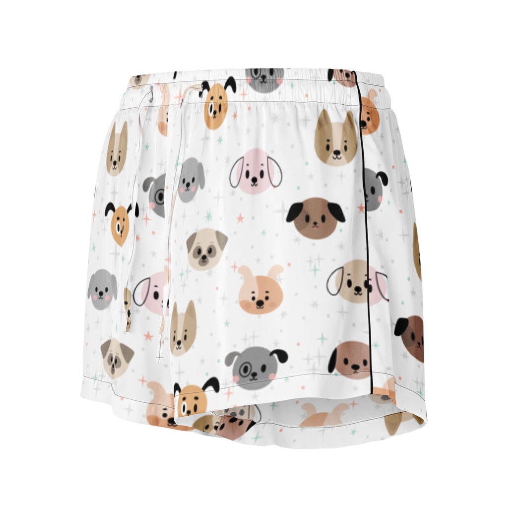 White silky pajama shorts for women with playful cartoon dog faces in beige gray and brown and a drawstring waist