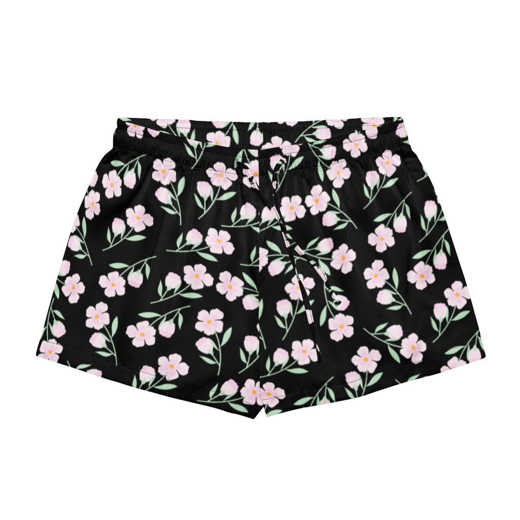 Women’s black silky pajama shorts with lightweight relaxed fit featuring pink floral pattern and green stems