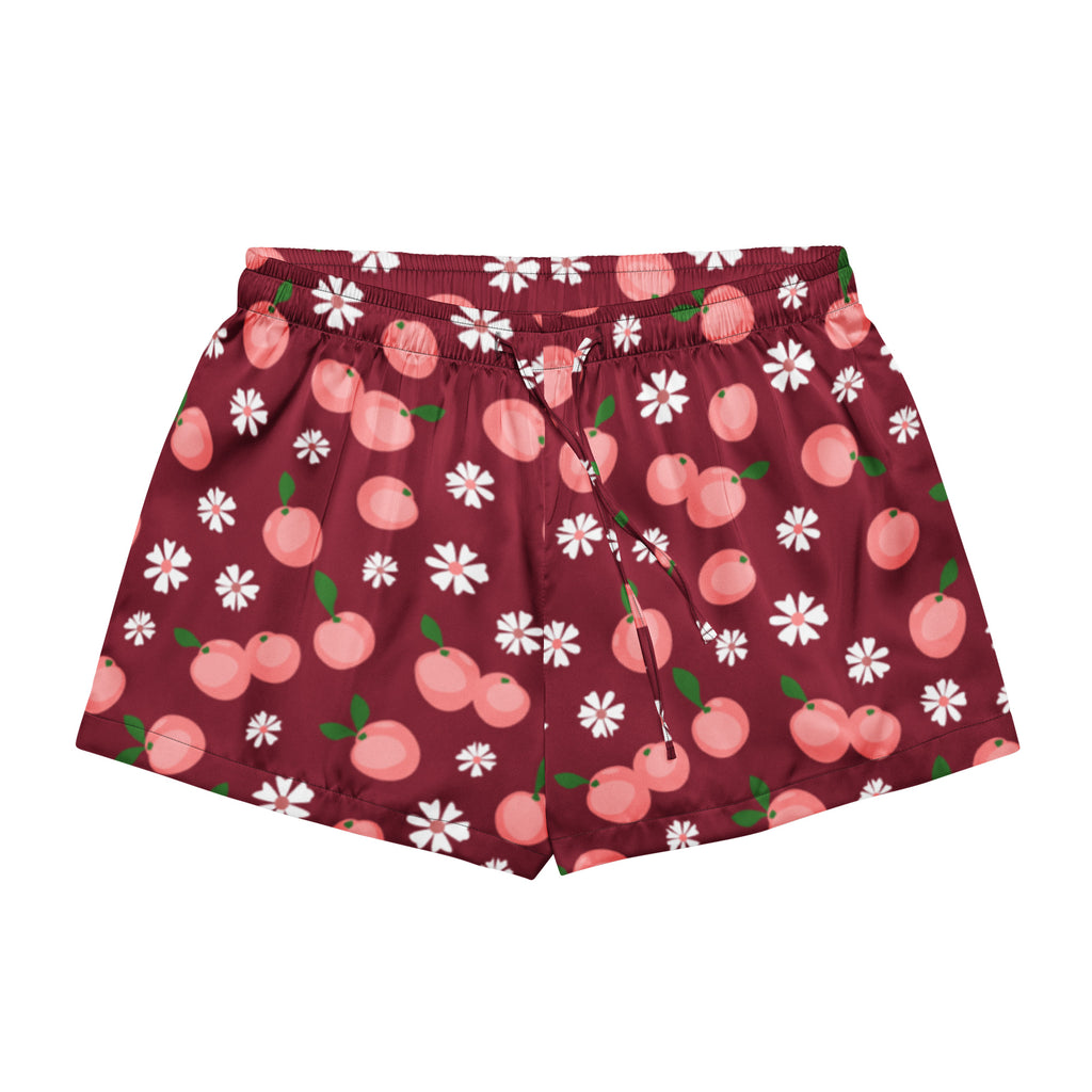 Women’s burgundy silky pajama shorts with playful pink peaches white flowers and green stems lightweight relaxed fit
