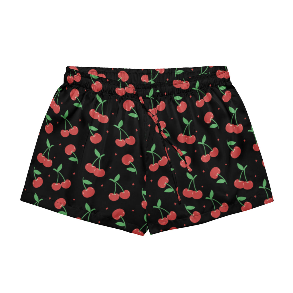 Women’s black silky pajama shorts with lightweight relaxed fit featuring red cherry and green stem pattern with diamonds