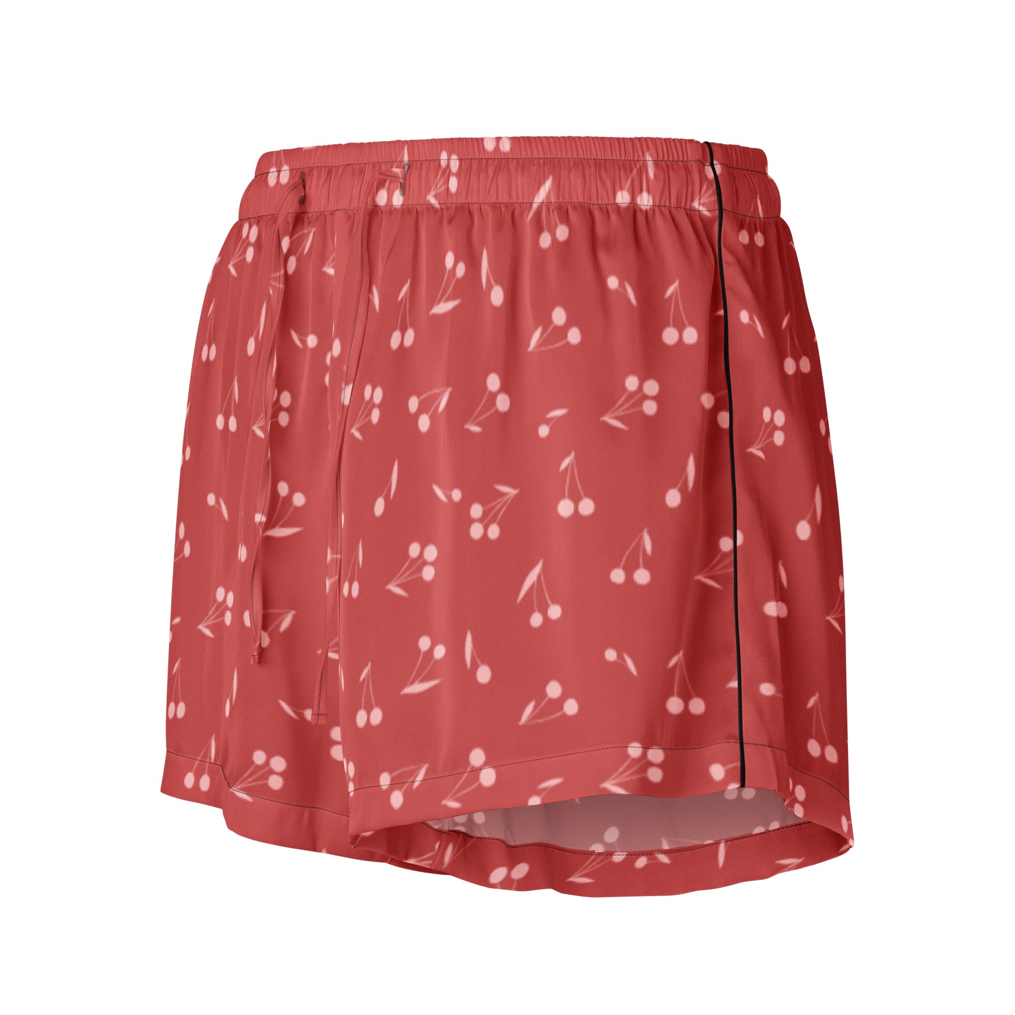 Women’s red silky pajama shorts with white cherry print and black side seam featuring lightweight relaxed fit and drawstring waist