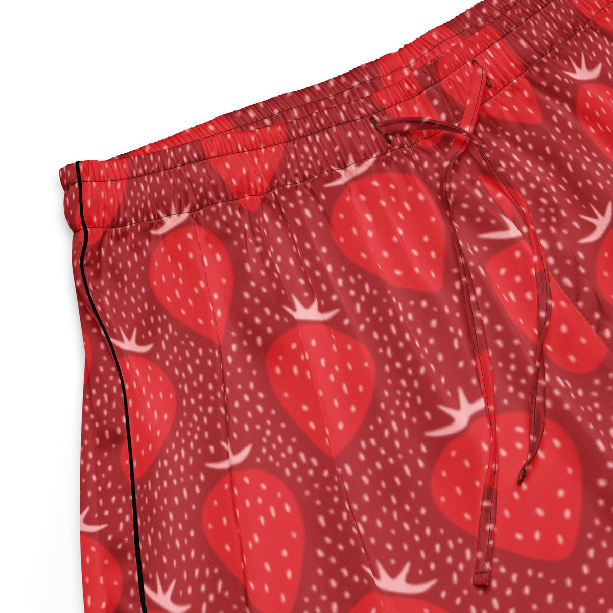 Women’s silky red strawberry-patterned pajama shorts with lightweight fabric and black drawstring waistband