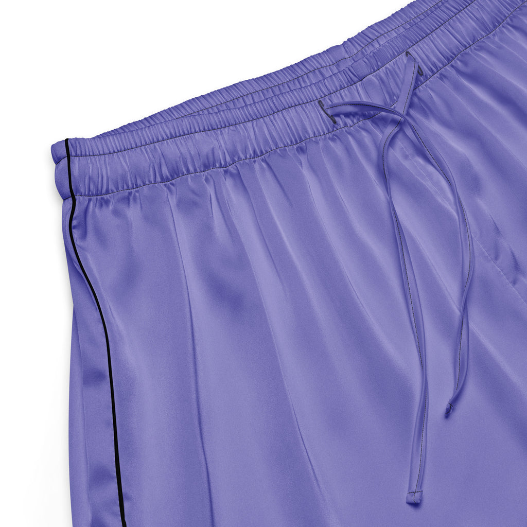 Women’s purple silky pajama shorts with black trim and drawstring waistband in lightweight relaxed fit satin material