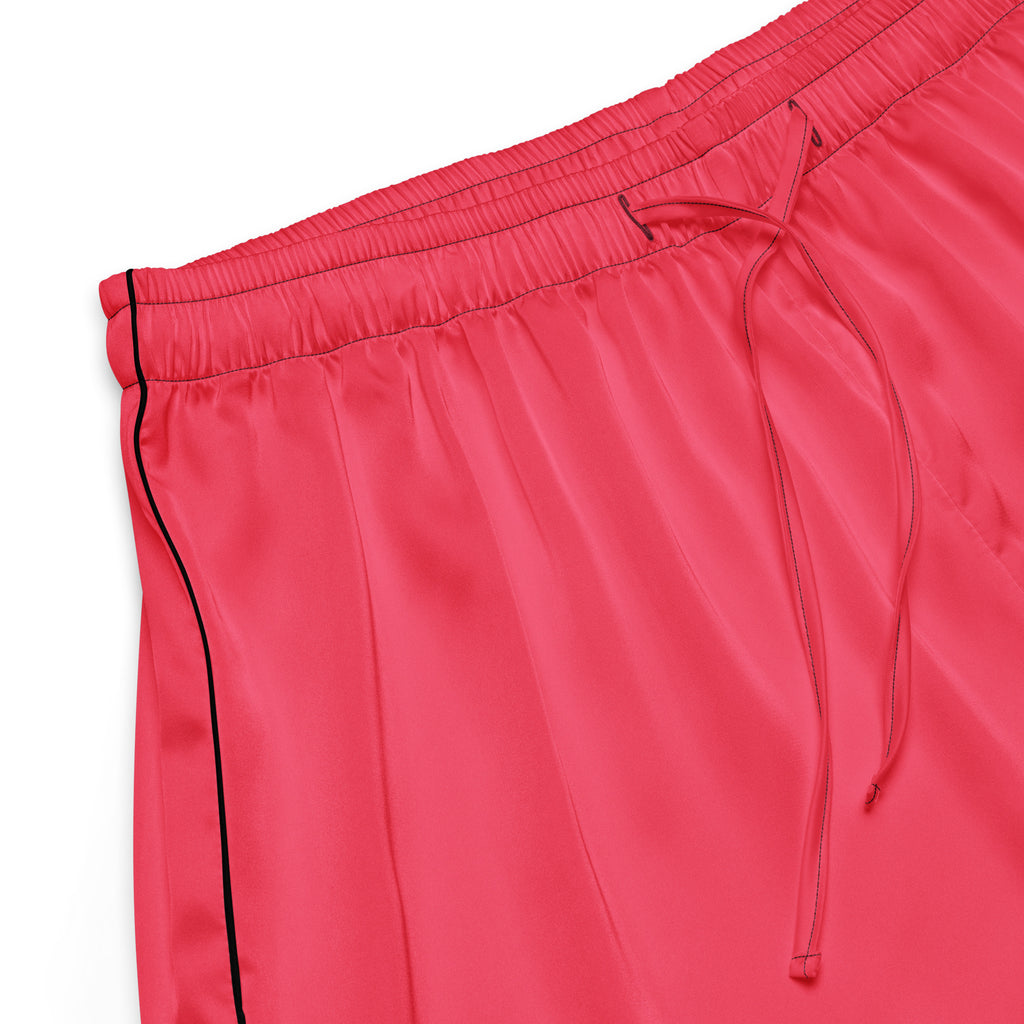 Women’s bright pink silky pajama shorts with black trim and a drawstring waistband for lightweight relaxed fit wear
