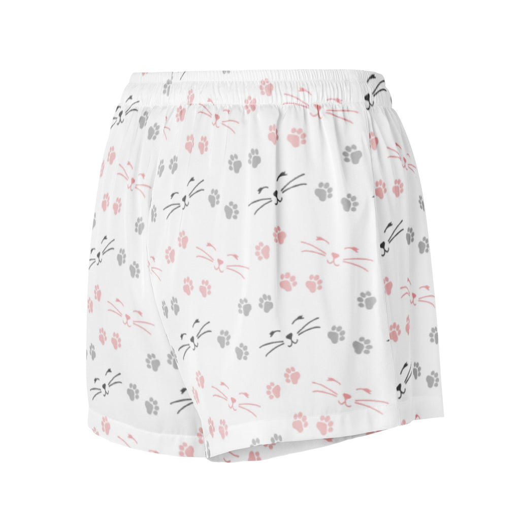 Women’s lightweight silky white pajama shorts with pink and gray cat face and paw print pattern and drawstring waist