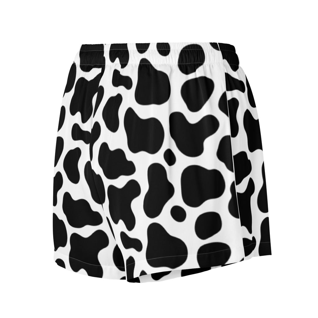 Women’s cow print silky pajama shorts in black and white with lightweight relaxed fit and stretchy elastic waistband