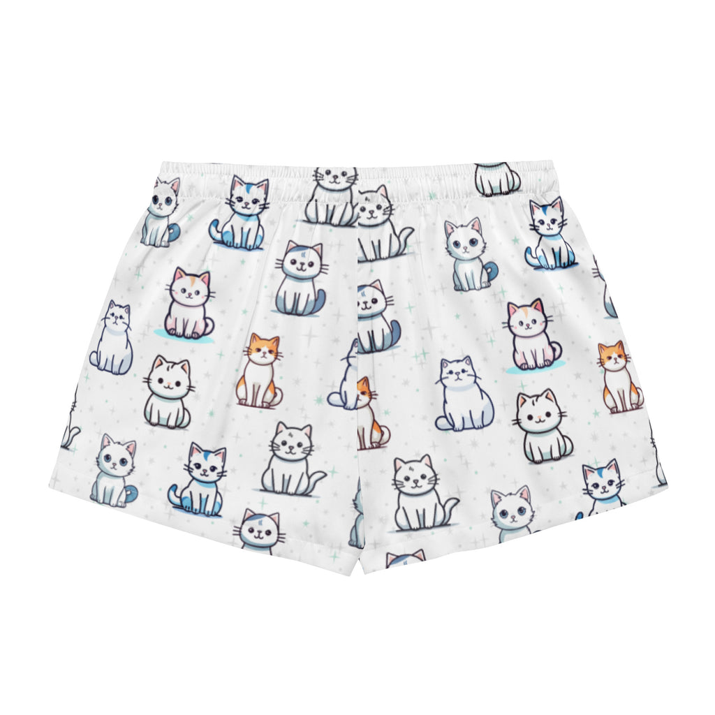 White silky women’s pajama shorts with playful cartoon cats print in various colors and a drawstring waist