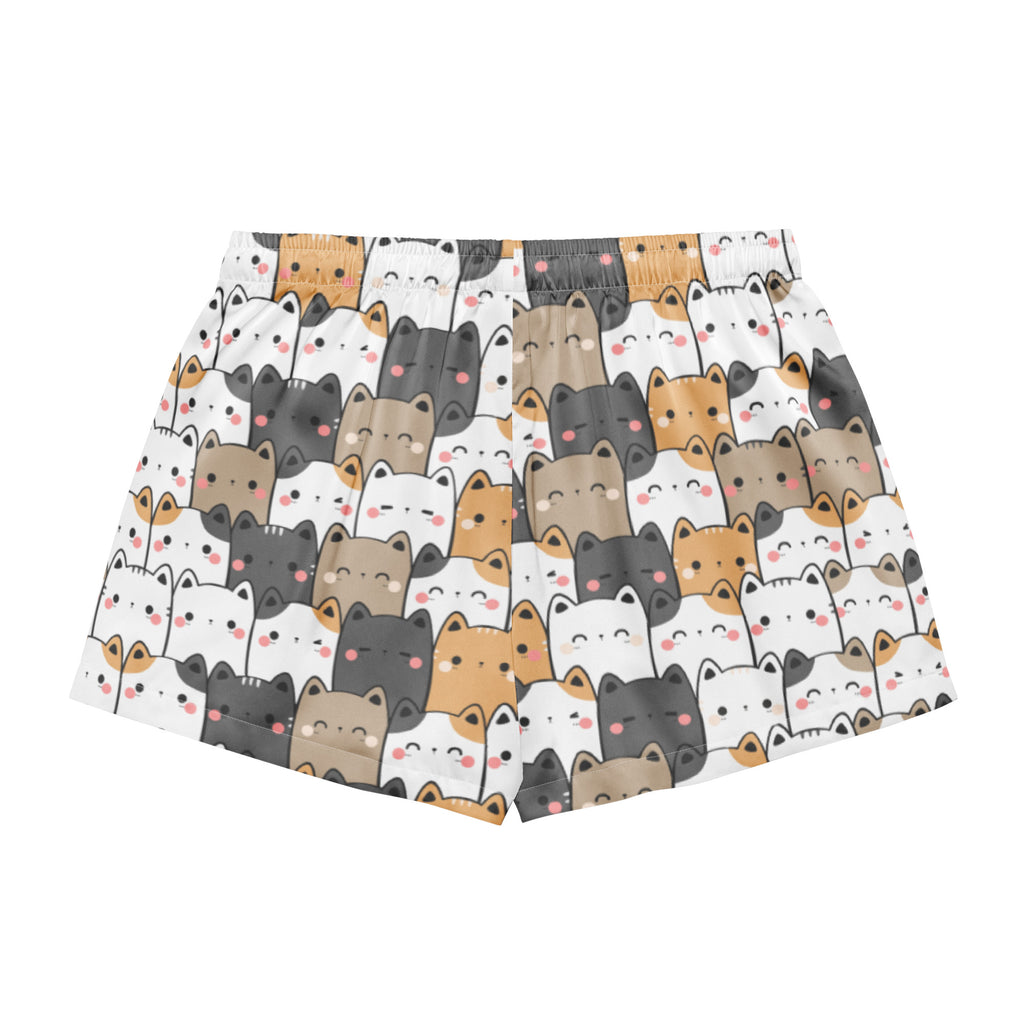 White boxer shorts with a playful multicolor cartoon cat pattern in a lightweight silky material with drawstring waist
