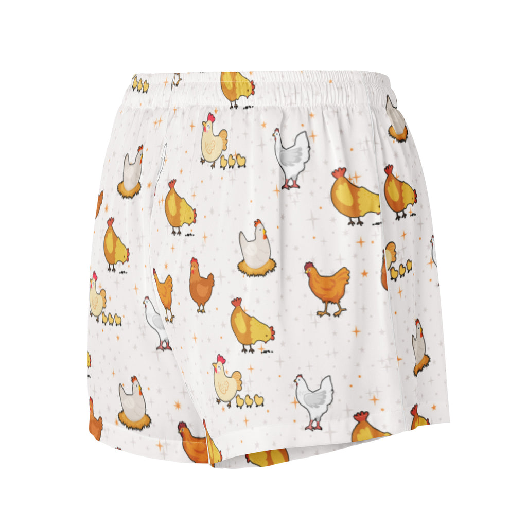 Women’s white silky pajama shorts with lightweight relaxed fit and playful multicolor cartoon chicken pattern