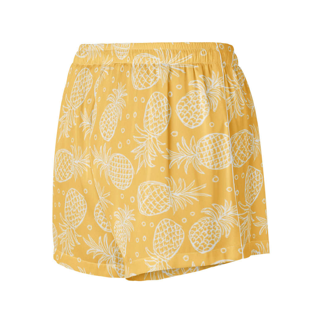 Women’s yellow silky pajama shorts with white pineapple pattern lightweight relaxed fit and drawstring waist