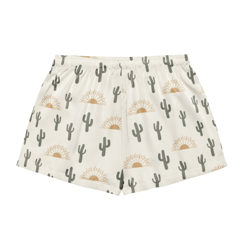 Cream-colored women’s silky pajama shorts with gray cactus and tan sunburst pattern lightweight relaxed fit