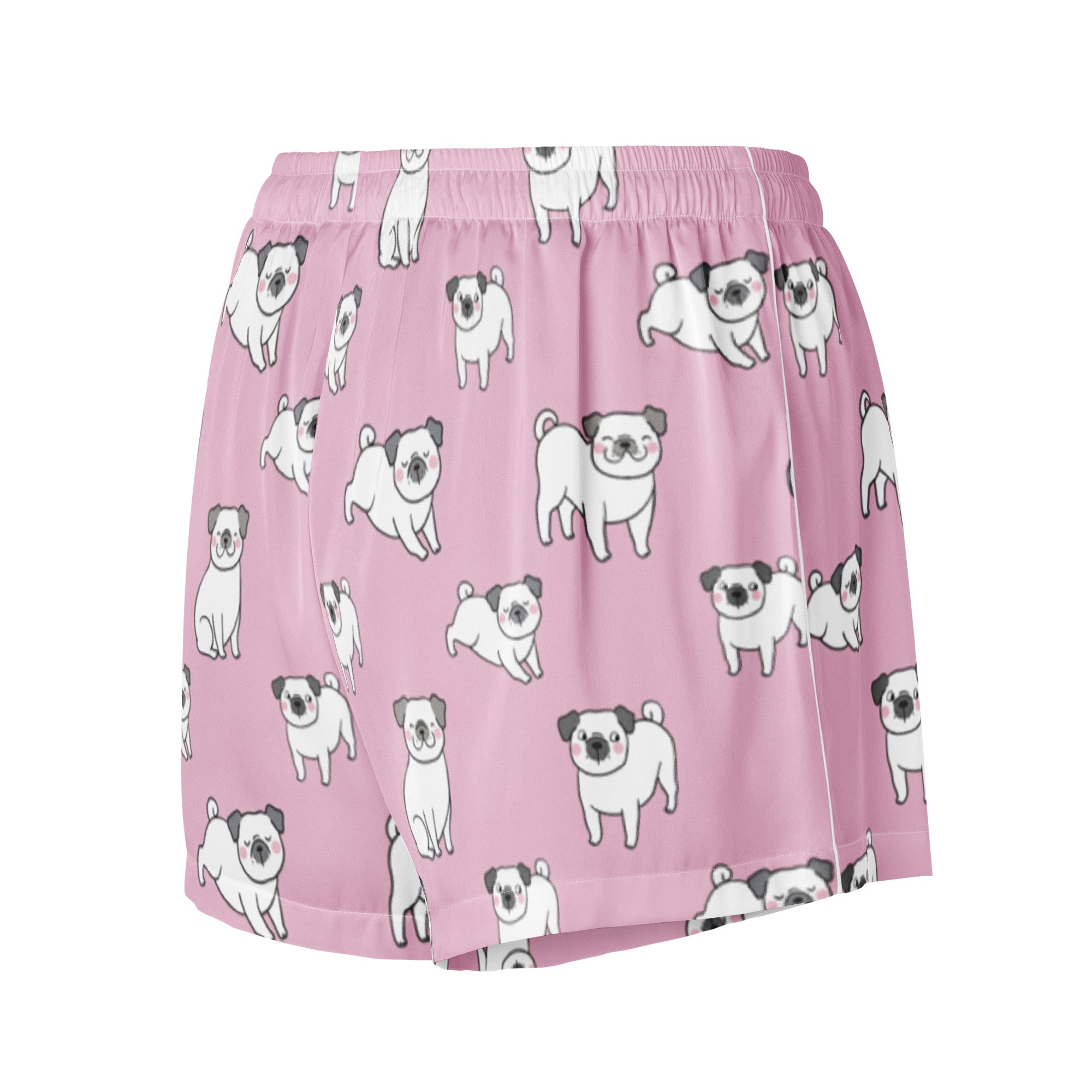 Women’s pink silky pajama shorts with a playful white pug pattern and a lightweight relaxed fit with drawstring waist