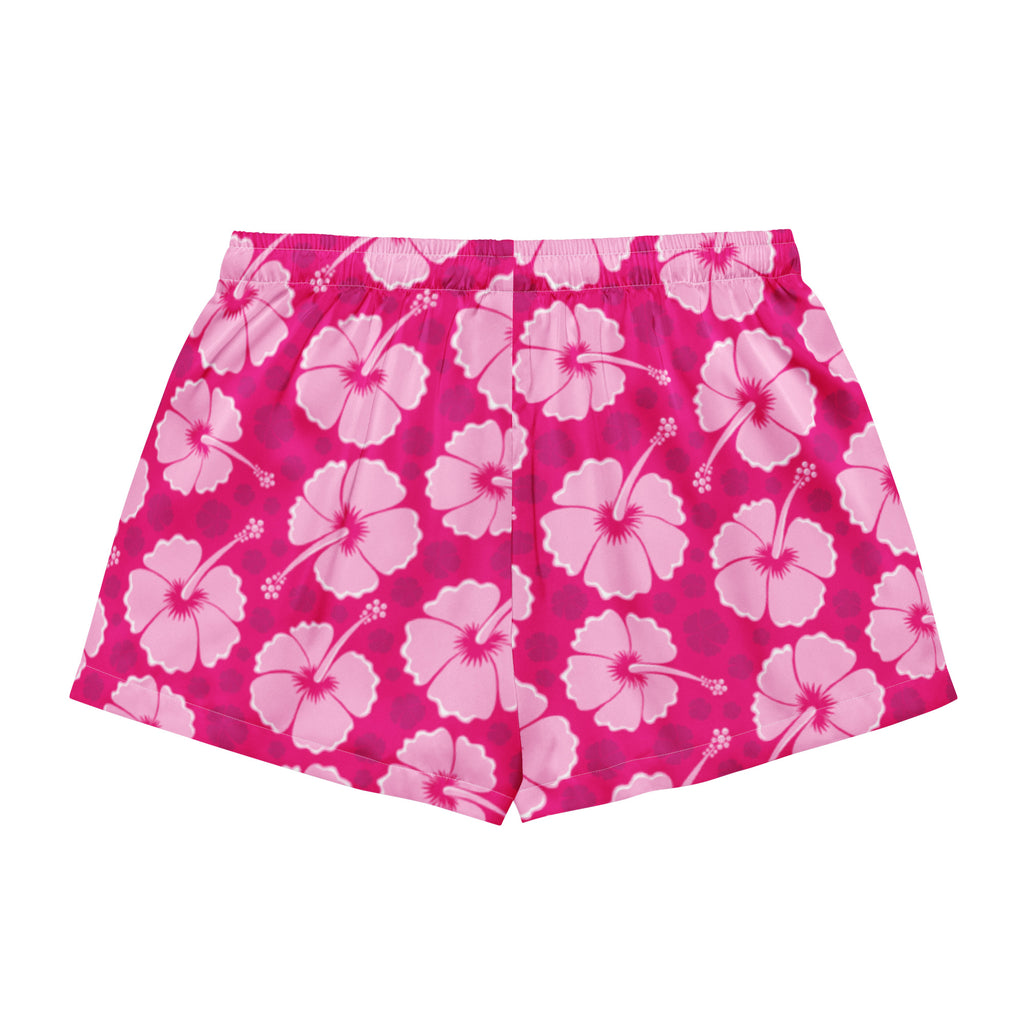 Women’s bright pink silky pajama shorts with a repeating hibiscus pattern and lightweight relaxed fit with drawstring waist