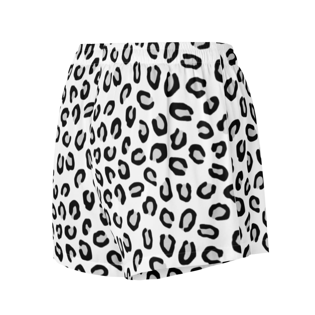 White silky pajama shorts with bold black leopard print, lightweight relaxed fit, and drawstring waist for women