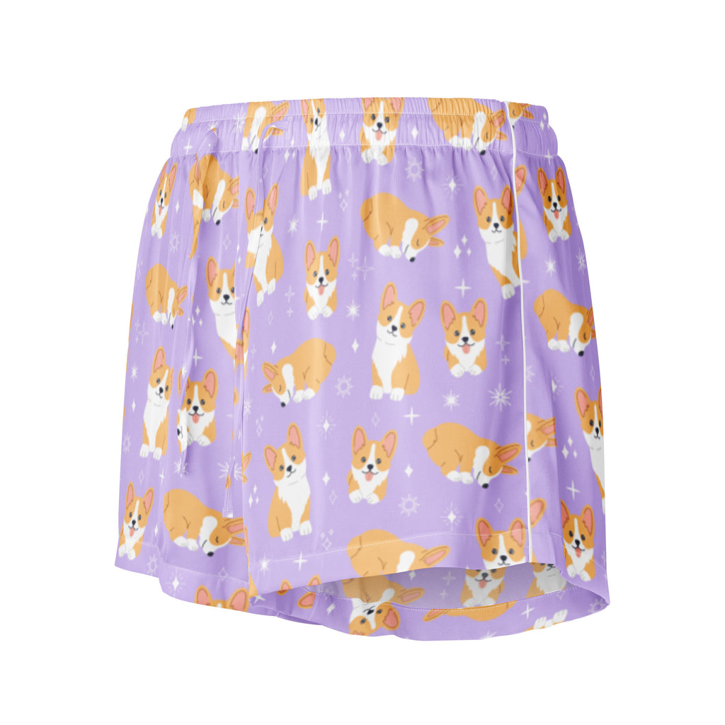 Women’s purple silky pajama shorts with cartoon orange and white corgis and star accents, lightweight relaxed fit
