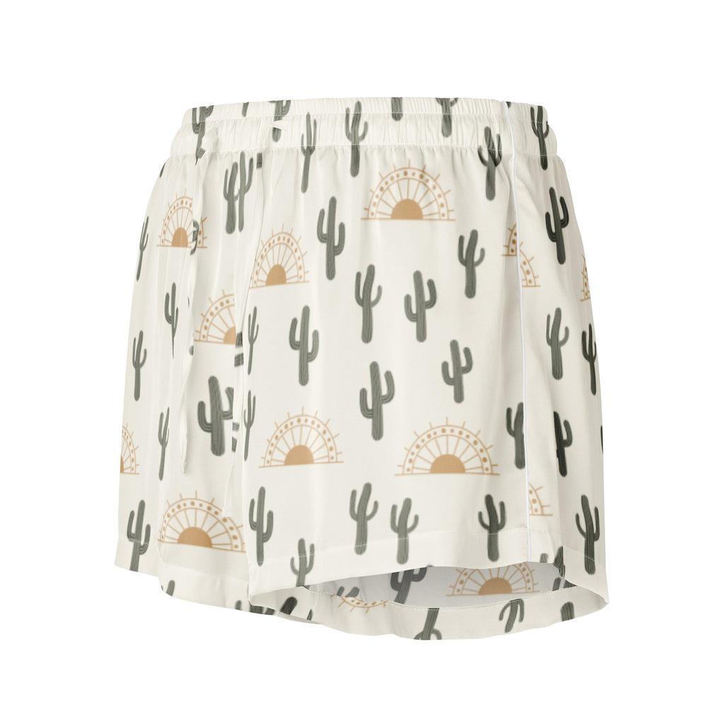 White silky pajama shorts with gray cactus and gold sun print featuring a lightweight relaxed fit and drawstring waist