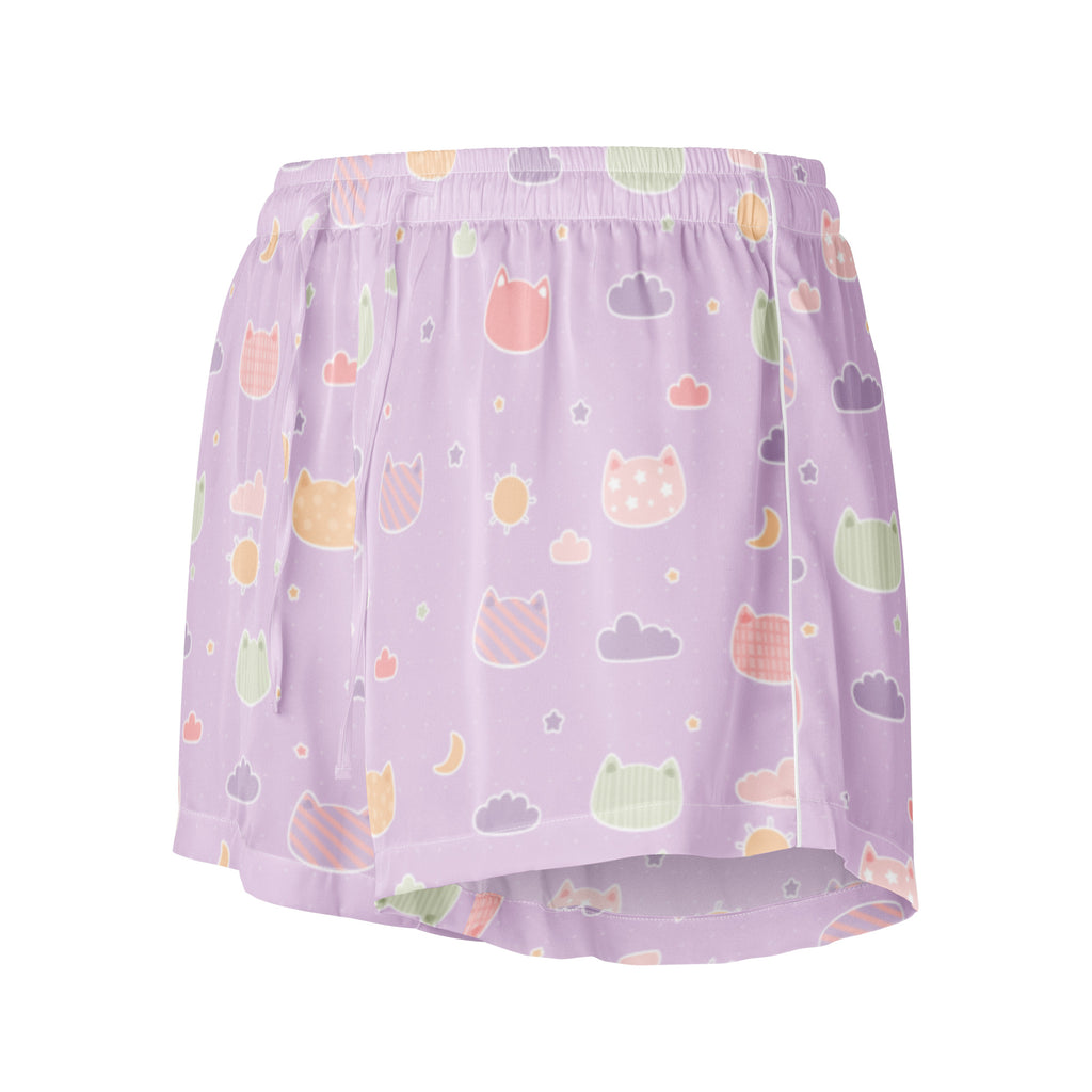 Lavender silky pajama shorts with pastel kawaii cats clouds moons and stars in a lightweight relaxed fit with drawstring waist