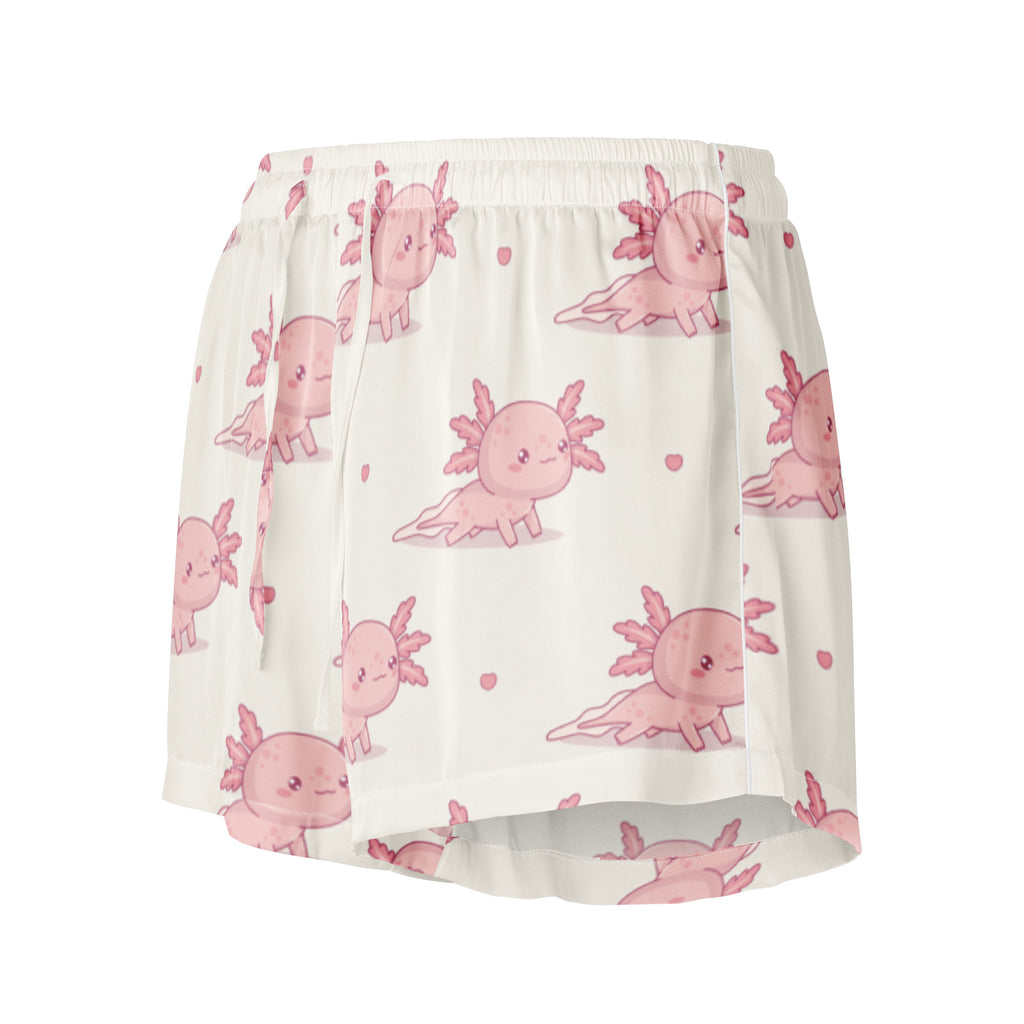 White silky pajama shorts with a playful pink axolotl pattern lightweight relaxed fit with drawstring waist