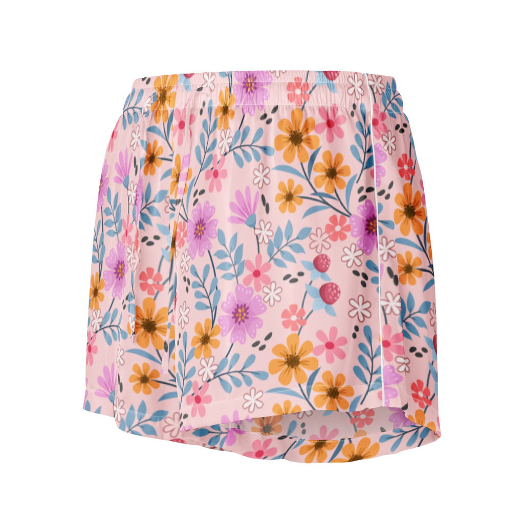 Women’s pink floral silky pajama shorts with vibrant orange purple and blue flowers on light pink lightweight relaxed fit