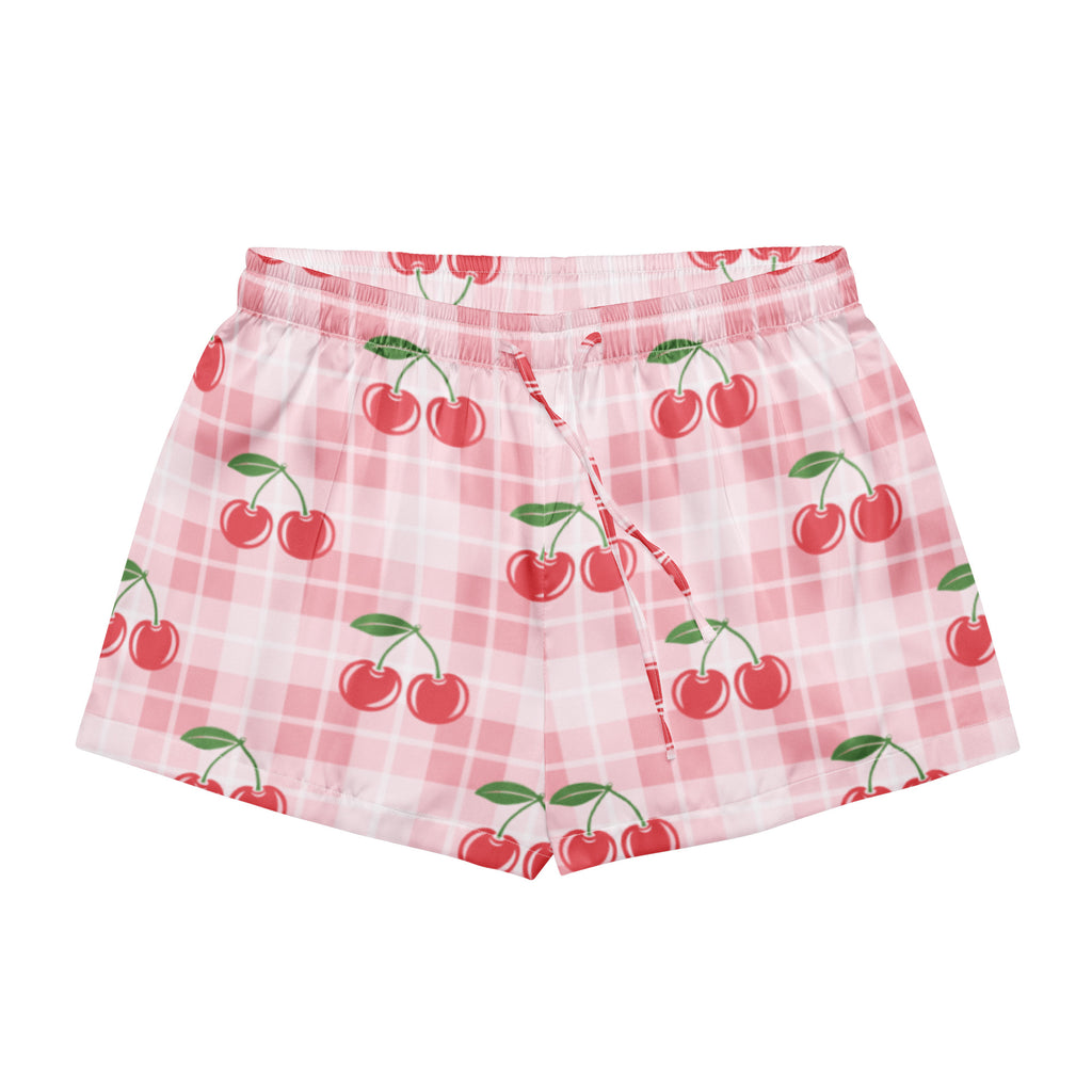 Women’s pink gingham cherry silky pajama shorts with lightweight relaxed fit and drawstring waist featuring red cherries and green stems