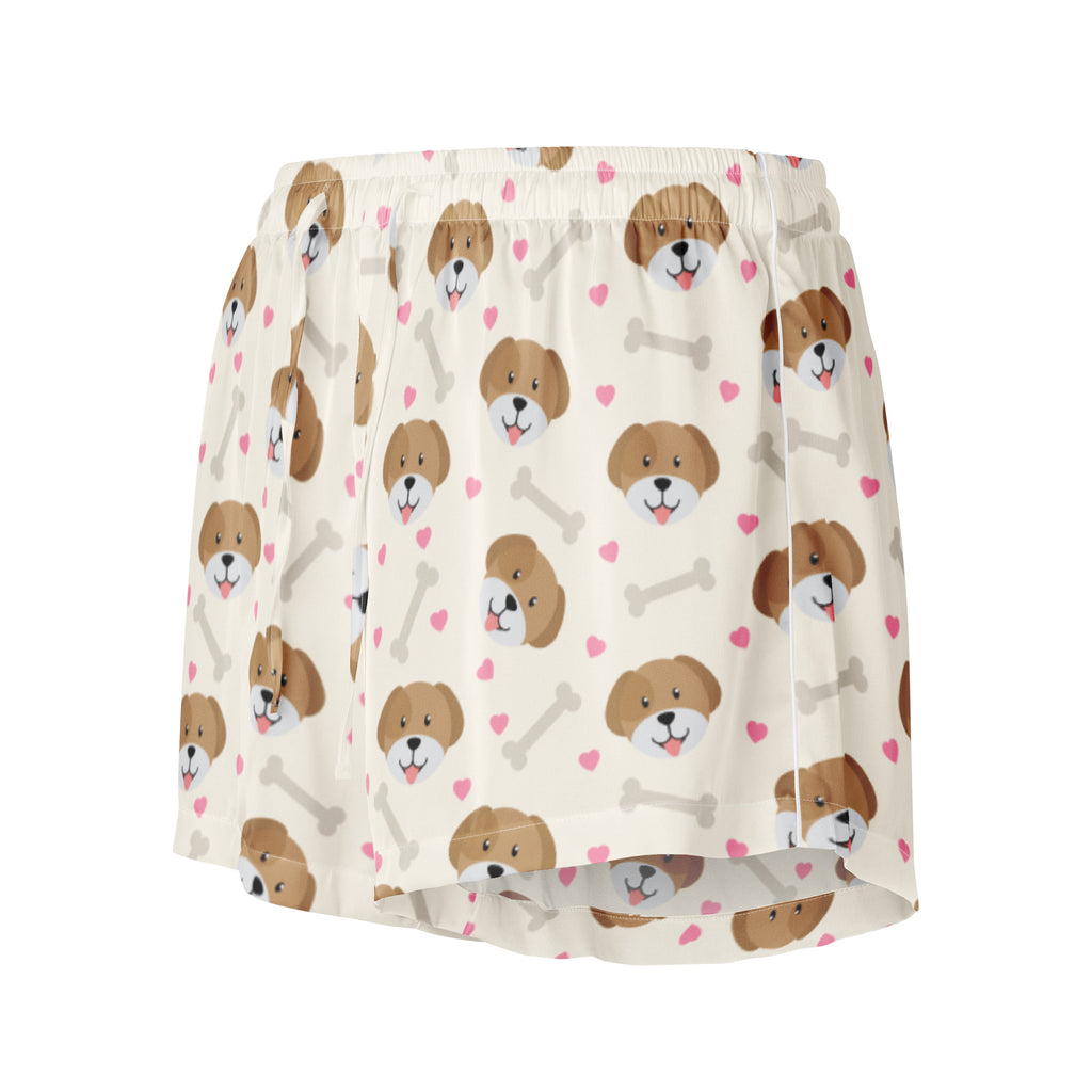 Women’s cream-colored silky pajama shorts with playful brown dog faces pink hearts and gray bones lightweight relaxed fit