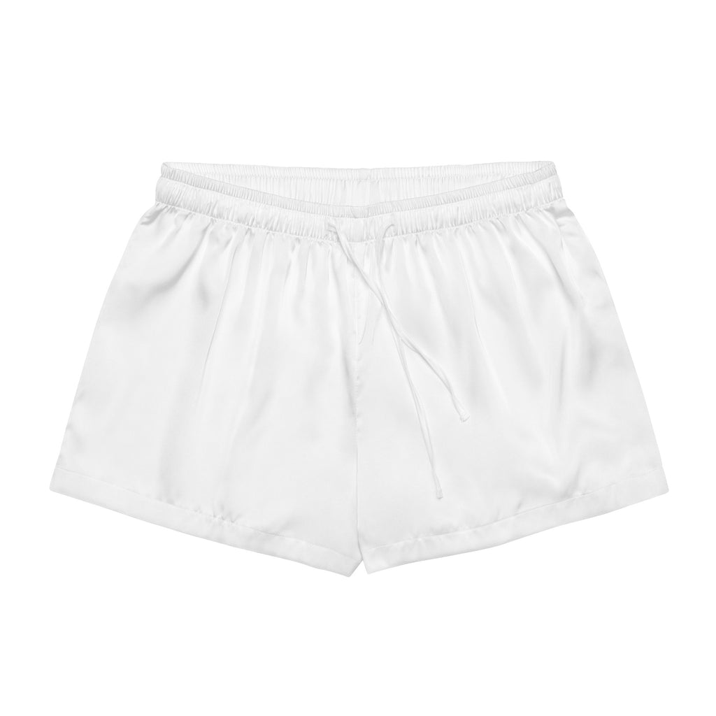 Women’s white silky pajama shorts made of lightweight satin with an elastic waistband and drawstring for relaxed fit