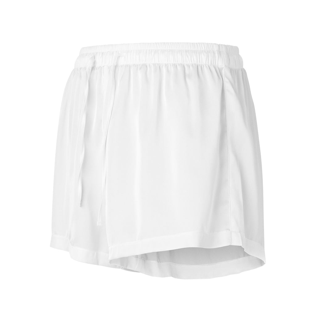 Women’s white silky pajama shorts with lightweight flowing fabric elastic waistband and relaxed fit for comfort