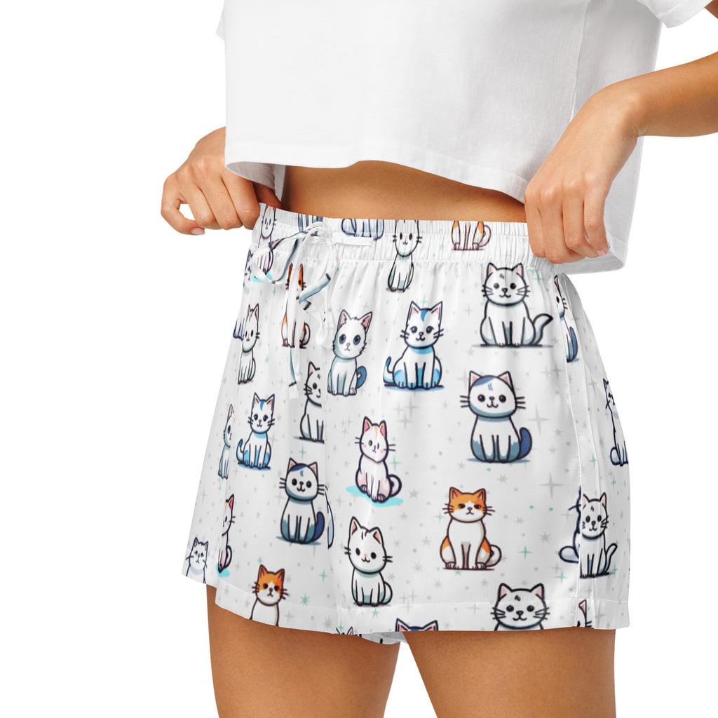 Women’s white silky pajama shorts with lightweight relaxed fit and playful colorful cartoon cat pattern with drawstring waist