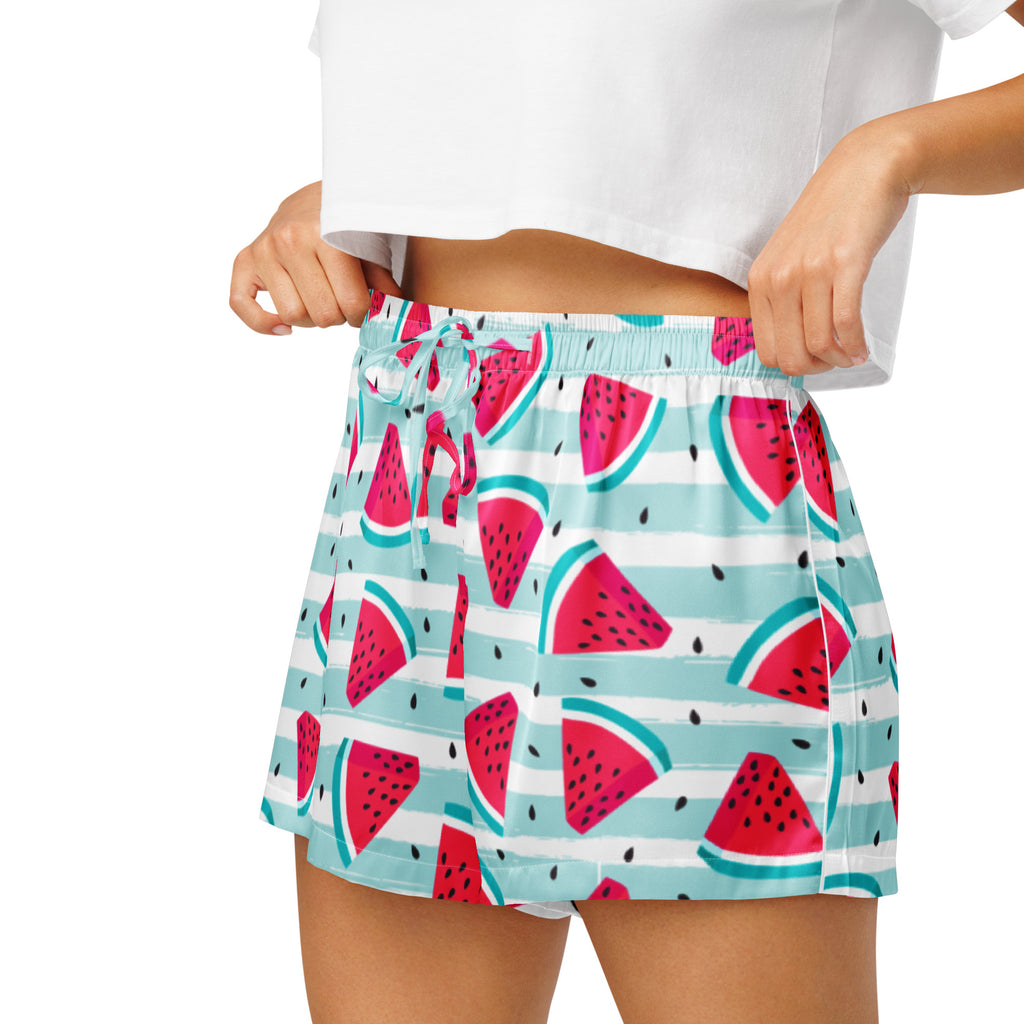 Women’s lightweight silky pajama shorts with a light blue and white stripe and vibrant pink watermelon print