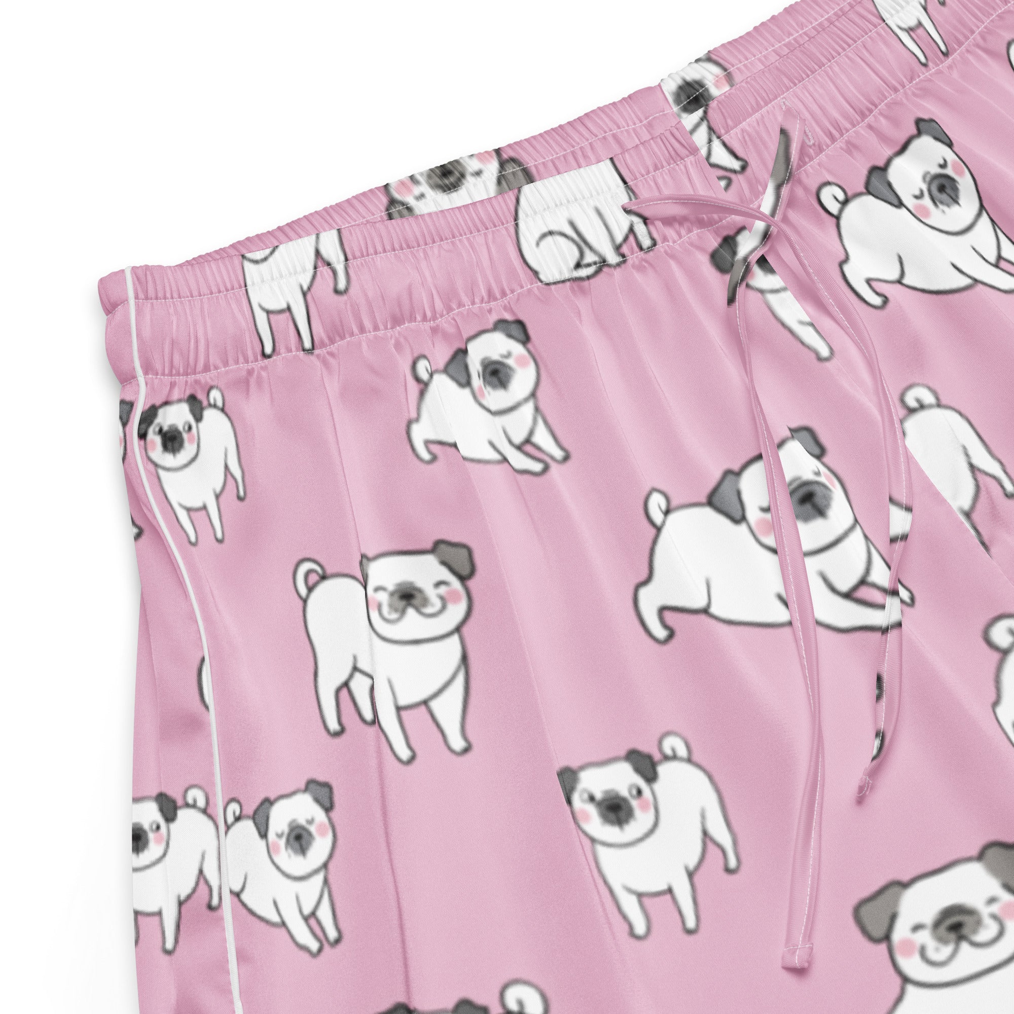 Women’s pink silky pajama shorts with playful white cartoon pugs black ears and noses lightweight relaxed fit with drawstring waist