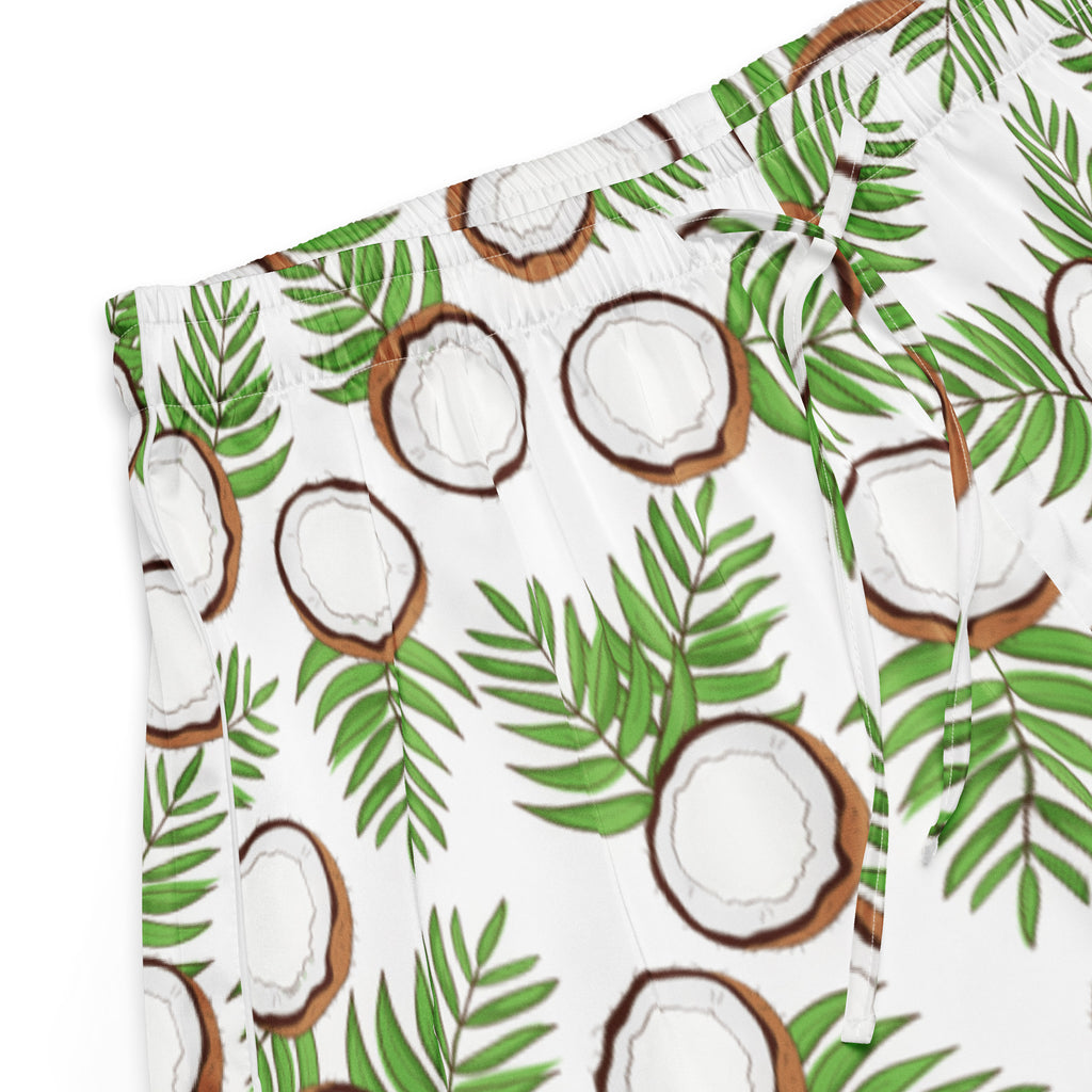 White silky pajama shorts with tropical green palm leaves and brown coconuts featuring a drawstring waist