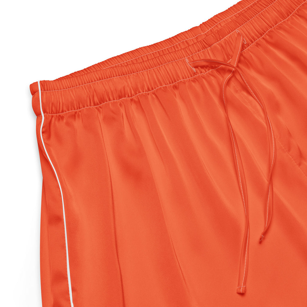 Women’s bright orange satin pajama shorts with white piping and drawstring waistband for lightweight relaxed fit