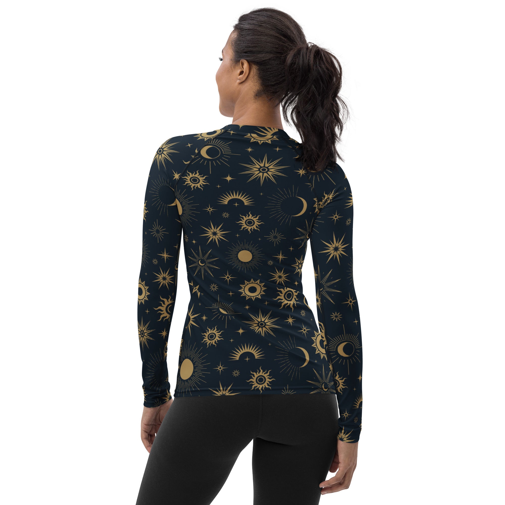 Dark blue womens long sleeve rash guard swim shirt with gold celestial sun moon star pattern and UPF 50 plus protection