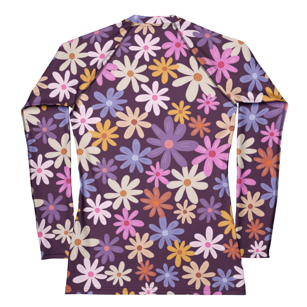 Women’s retro floral buttery soft long sleeve rash guard with multicolored daisies on deep mauve and UPF 50+ protection